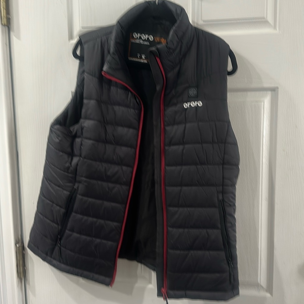 Ororo ladies black rechargeable heated vest. Size L. Perfect condition.